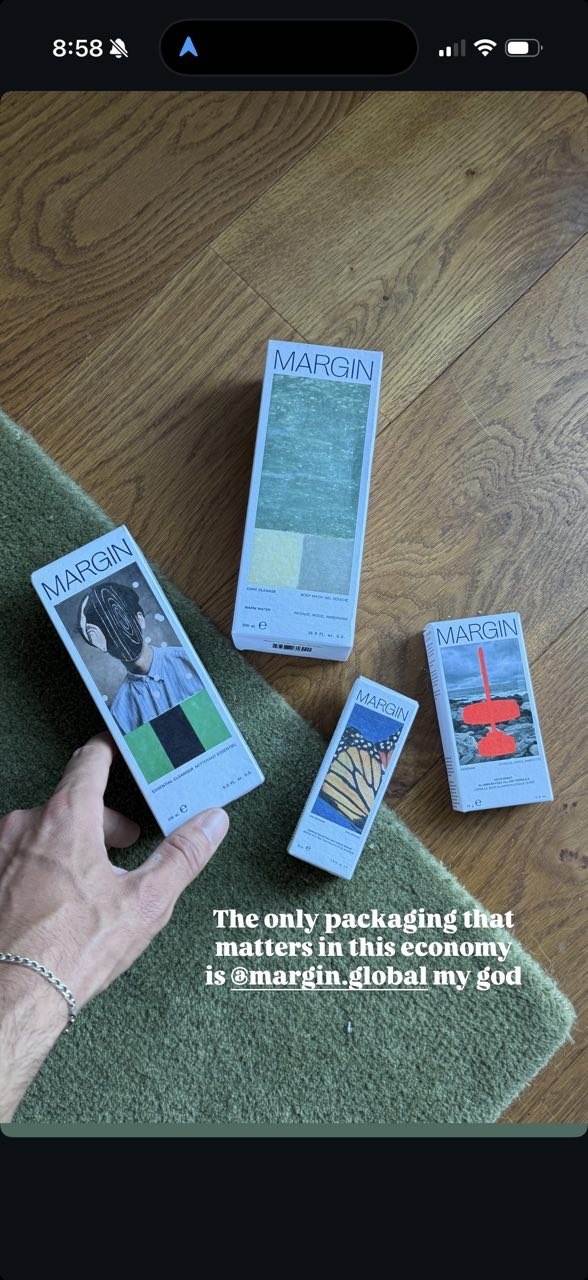 Margin packaging photographed casually on a floor